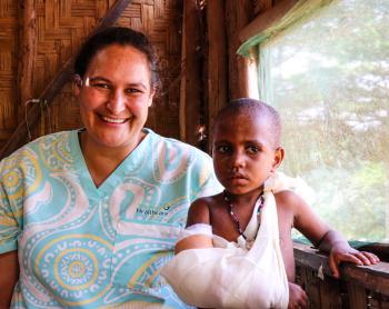 Marino Vickers and the Health Patrol team attending to patients in Yambaitok. Photo by Kowara Bell.