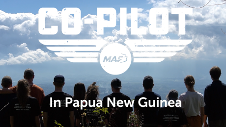 The Co-pilot team is standing at the top of Rondon Ridge looking over Mount Hagen