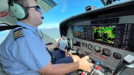 Tim Neufeld behind the controls of the Cessna Caravan
