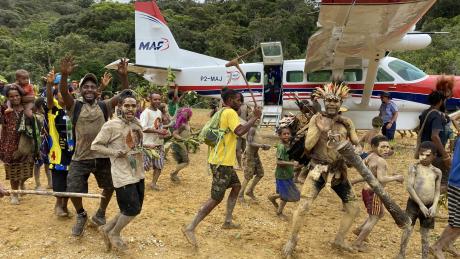 People of Yakona celebrating their new airstrip