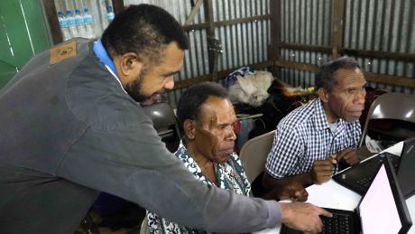 Caine Ruruk, MAF Technologies training facilitator, assisting participants during a session