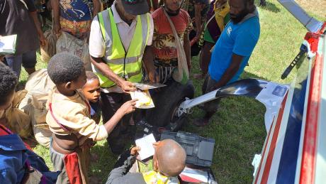 Bibles being sold at Mengau