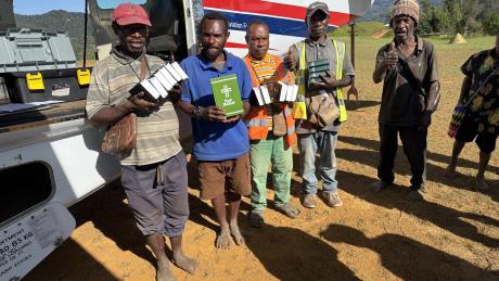 Pastors at Sengapi holding Bibles