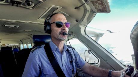 A pilot in the cockpit