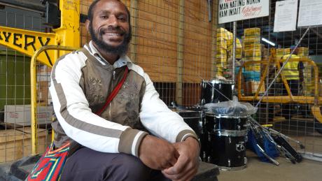 Emrick Willie next to his new drum kit