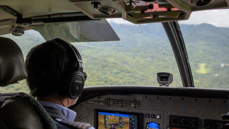 Bridget Ingham on the controls and on approach to one of the bush airstrips