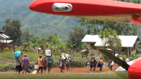 Medical supplies being carried to the aid post