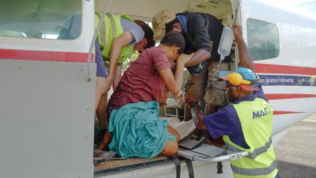 A week’s walk in 25 minutes: Medevac just in time for Phimi