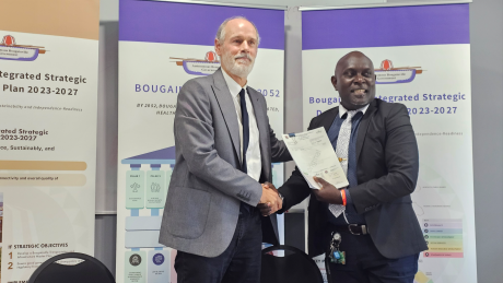 John Woodberry and Chief Secretary Mr. Nanei shaking hands