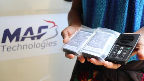 An audio Bible in someone's hands