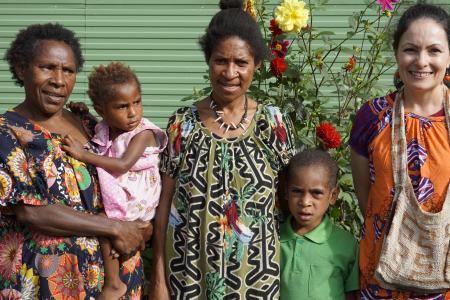 Group photo of Selah holding a toddler, Jesslyn and Richard and Bernadette Axon