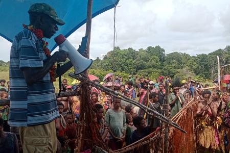 Local dignitaries hold speech at testlanding for Aiyu Airstrip