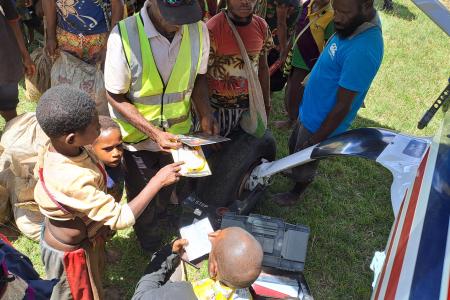 Bibles being sold at Mengau
