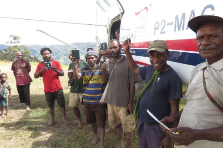 Group of people at Gebrau with Bibles