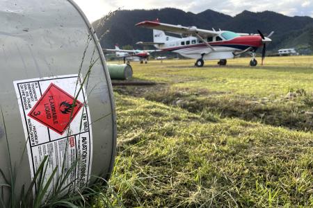 view from fuel yard Telefomin to parking area with 2 MAF planes
