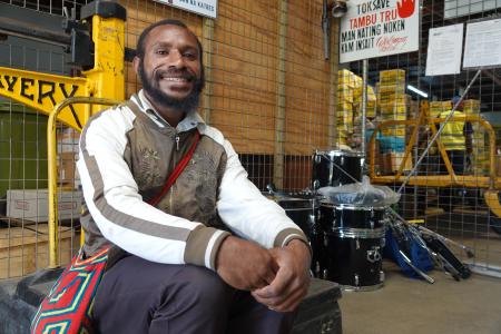 Emrick Willie next to his new drum kit