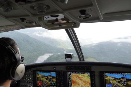 MAF plane on final to Sisamin airstip - cockpit view with pilot Ryan Cole