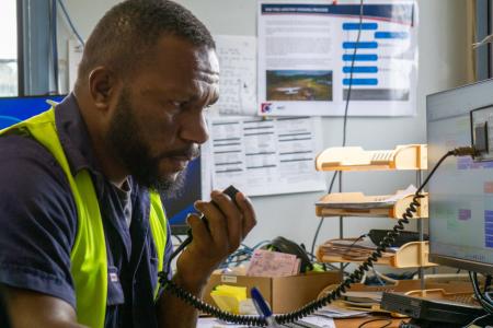 A man talks on a radio