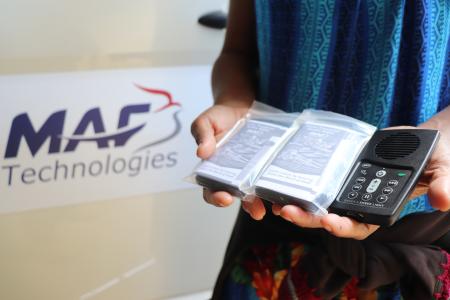 An audio Bible in someone's hands