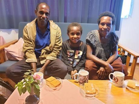 Pastor Joe Dai, wife Dora, daughter Julie from Mt Aue