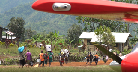 Medical supplies being carried to the aid post