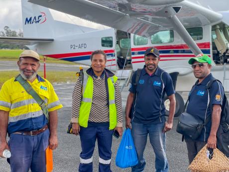 RAA team prior to boarding their MAF flight in P2-AFD
