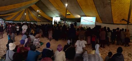 Mt Hagen Community Outreach Event_people in tent.