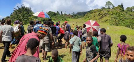 Mount Tawa people walking up the airstrip