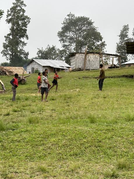 village children playing rugby