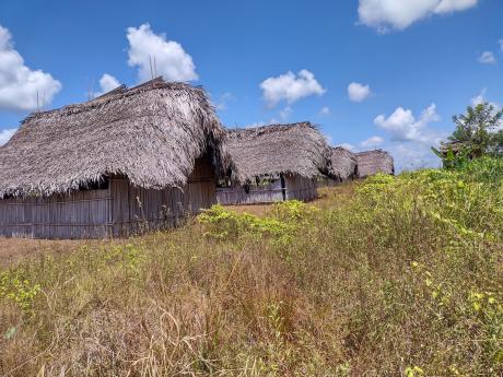 Deteriorated bush material classrooms of a remote primary schoolin Paimbit village, Angoram district.