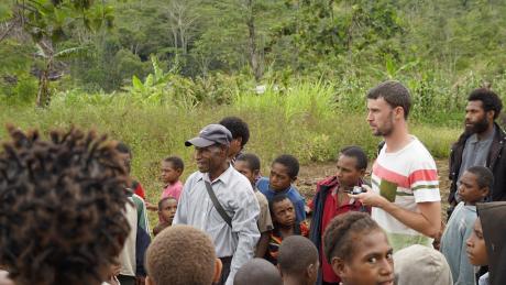 Pastor Dani Denge looking towards his village Lapalama