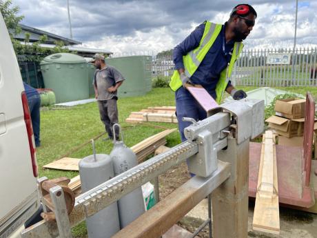 weighing the materials at the MAF yard