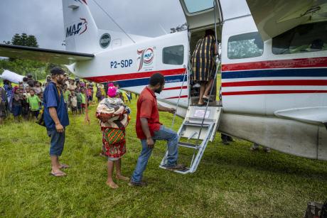 MAF customers in a remote area boarding the MAF plane 