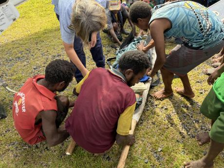 Patients gets moved to the MAF stretcher 