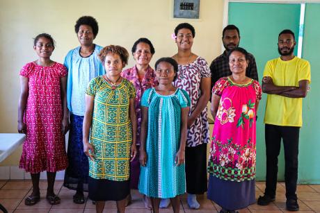 Salem Training Institute students and teachers posing for a picture indoor.