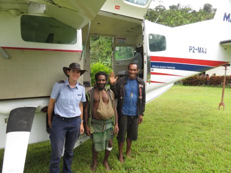 Bridget with Yinge and the health worker in Yifki
