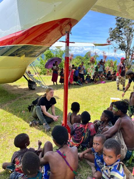 Stephanie Hald talking to local kids under the wing