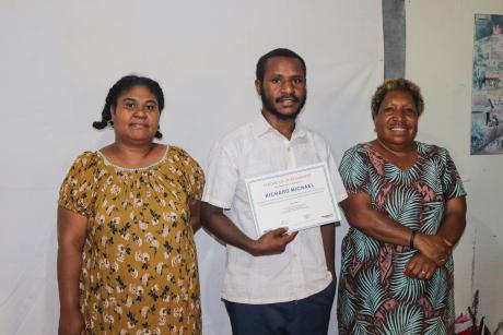 Richard receiving his certificate of attainment after successfully completing his BCT training.