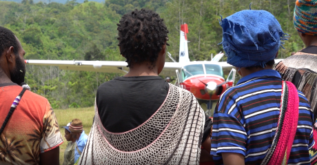 Mothers looking at the MAF plane