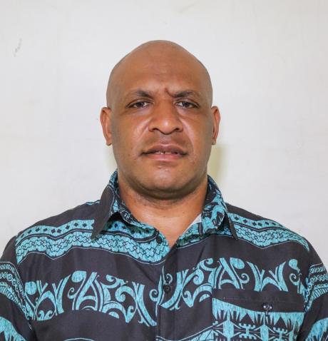 A portrait of Joel Maipson, Basic Computer Training Facilitator at Every Home for Christ.