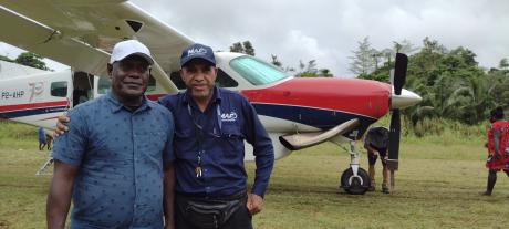 Caine Ruruk and Pastor Albert at Buin Airstrip