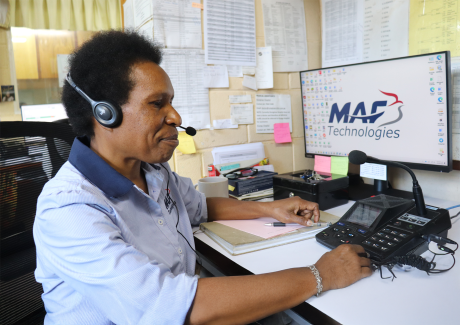 A woman using a radio headset
