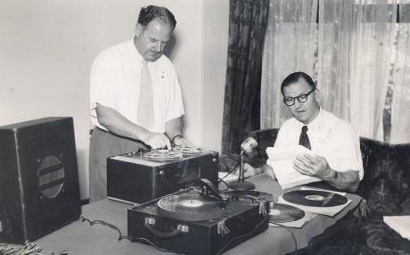 Two men recording audio