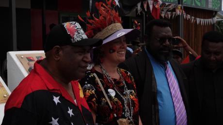 Hon. Solan Mirisim, Siobhain Cole and Governor Hon. Tony Wouwou in front of the newly erected MAF Monument at Telefomin Station