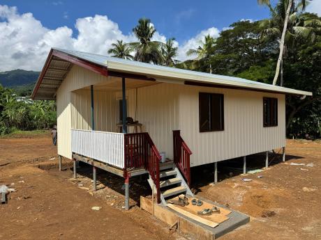 The newly constructed health centre building takes shape at Yambaitok.
