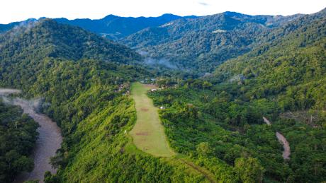 Aerial view of Yambaitok airstrip and nearby community